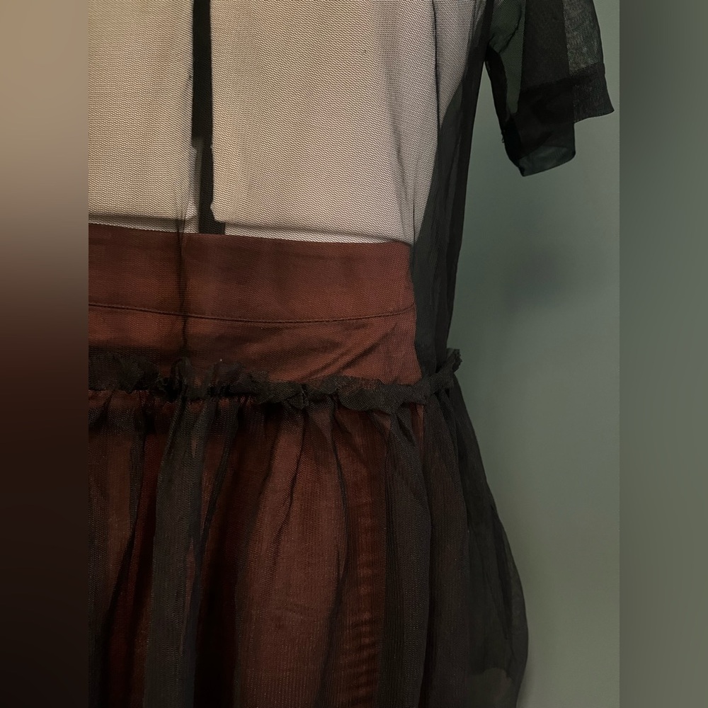 Sheer peplum top